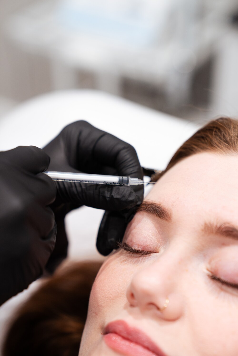 Clinician performing precise wrinkle reduction treatment in Roseburg