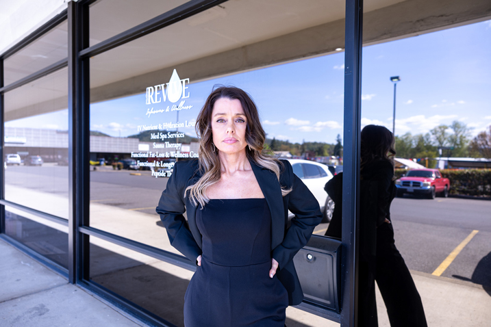 Chenelle McCaskill, medical provider and CEO, standing in front of Revive Infusions & Wellness in Roseburg, Oregon, leading transformative programs in weight loss, IV peptide therapy, nutrition, and overall wellness.