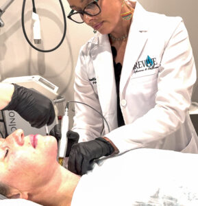 Provider Chenelle administering PRP with microneedling to rejuvenate aging skin in a luxury Roseburg Oregon treatment room.