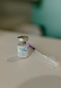 Botox with syringe on medical counter. XEOMIN neurotoxin treatment for wrinkle reduction and facial rejuvenation at Revive Infusions & Wellness, a luxury medical spa in Roseburg Oregon.