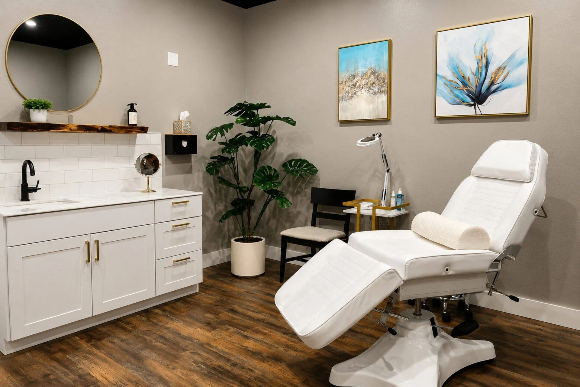 A REVIVE aesthetic treatment room with a reclining treatment chair at the Roseburg clinic