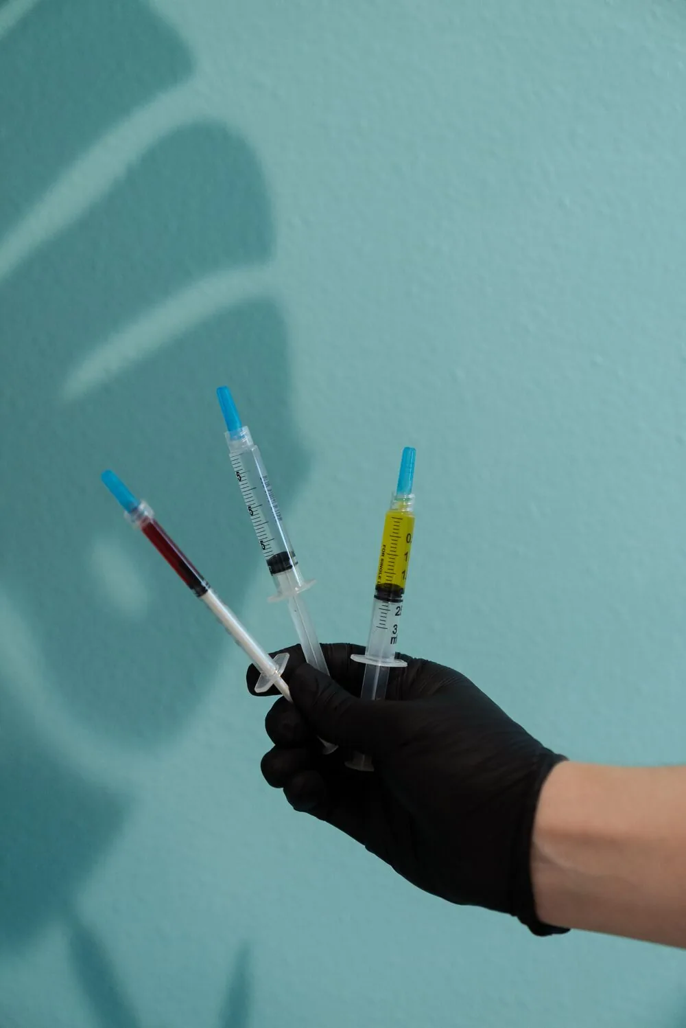 REVIVE clinician preparing peptide therapy syringes at the Roseburg, Oregon clinic
