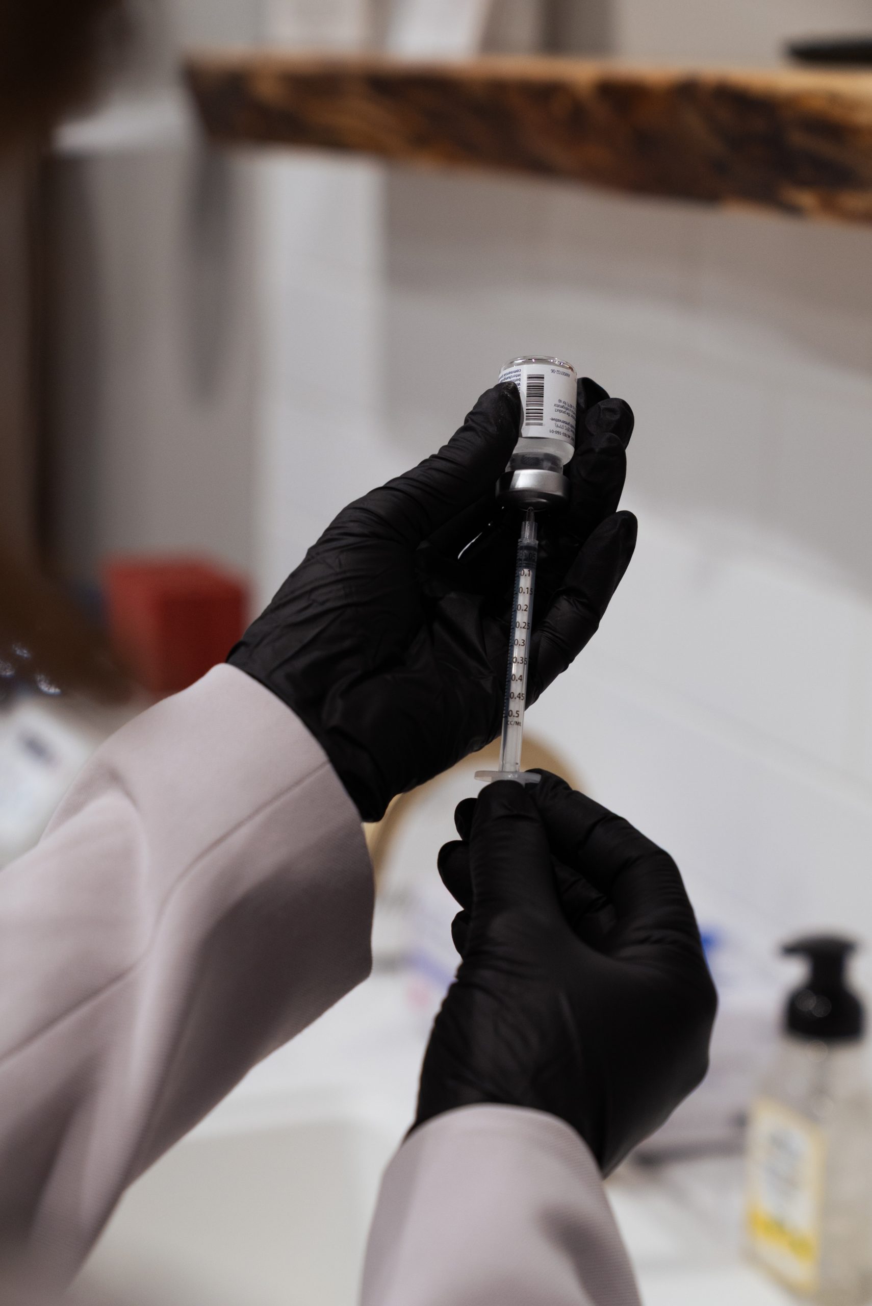 Microneedling pen treatment on forehead at REVIVE Roseburg clinic